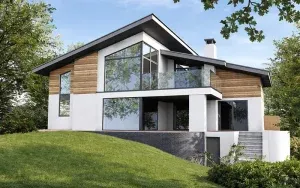 Modern house nestled into a hill with big windows and wood panelling