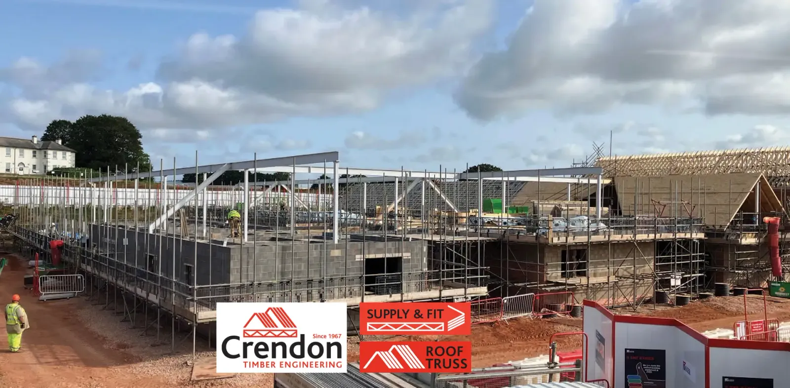 Building under construction surrounded by scaffolding