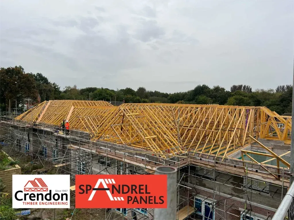 Spandrel panels forming the structure of a roof under construction