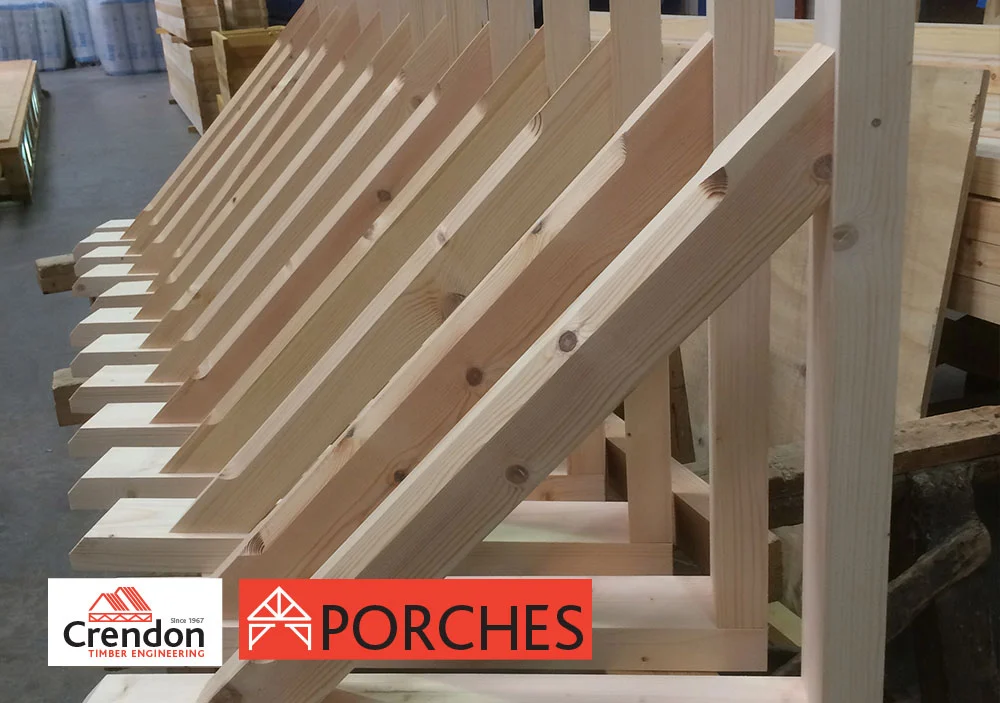 Timber panels attached in a triangular shape lined up in a row