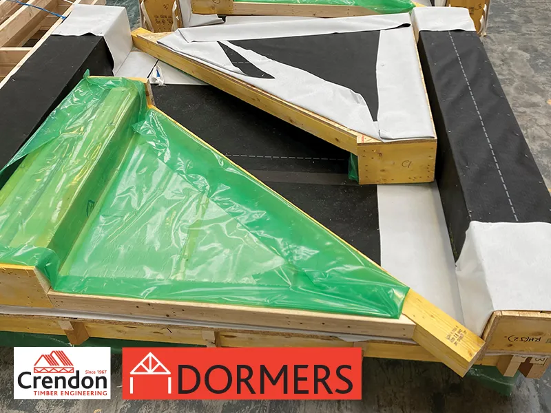 Dormers in construction. Timber panels with materials nailed to them